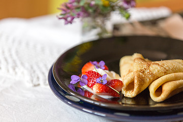 Image showing Pancakes, strawberries and cream