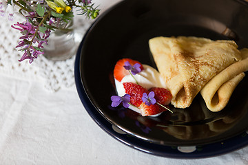 Image showing Pancakes, strawberries and cream