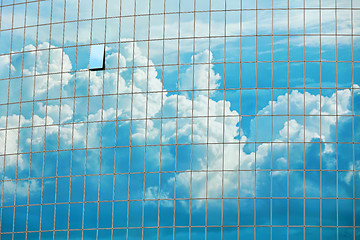 Image showing Sky reflected in the skyscraper windows background