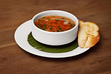 Image showing Seafood soup with toasted bread