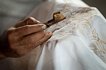 Image showing Batik painting on a white cloth process