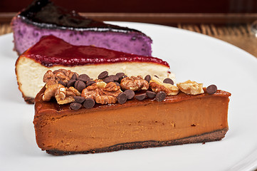 Image showing cheesecake with chocolate and nuts