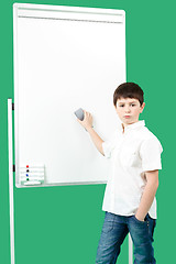 Image showing Portrait of happy little boy with white blank board