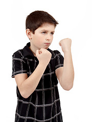 Image showing teen boy boxer trains defence