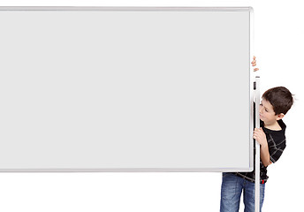 Image showing Portrait of happy little boy with white blank board