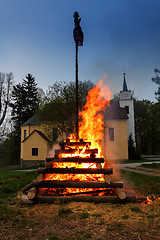 Image showing big walpurgis night fire with witch on pile behind the church