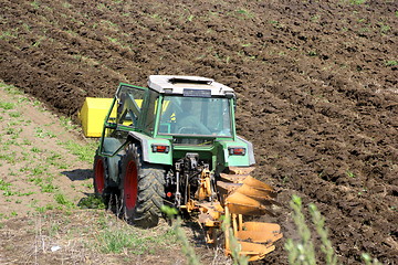 Image showing tractor ploughing the land 