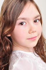 Image showing pretty 8 year old girl in white dress