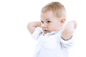 Image showing Handsome small boy with raised arms