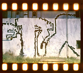 Image showing Aged street wall background. Film strip