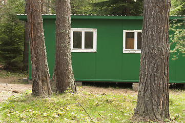 Image showing Green bungalow in the forest