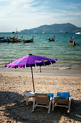 Image showing Two chairs and umbrella on the beach