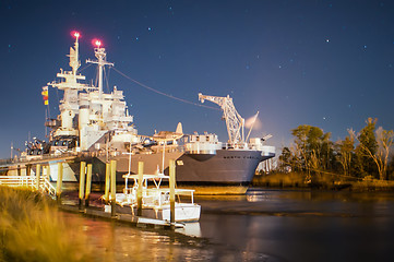 Image showing Battleship North Carolina at it's home in Wilmington at night