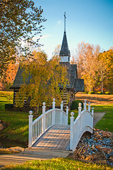 Image showing small chapel across the bridge in fall