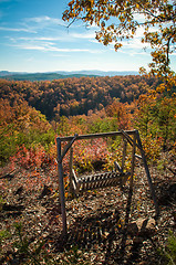 Image showing swing bench overlooking mountains