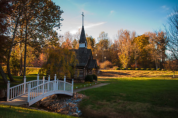 Image showing small chapel across the bridge in fall