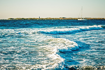 Image showing ocean waves and yaht in the sea