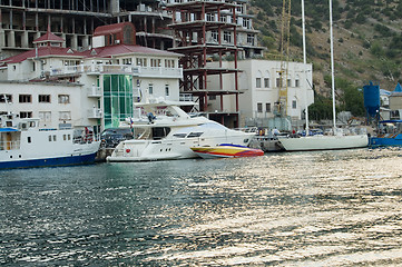 Image showing yachts near a bank