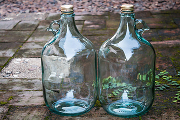 Image showing Big glass wine bottle for recycle purpose 