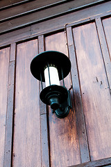 Image showing Vintage wood wall with walkway retro lamp