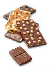 Image showing Various chocolate bars on white background