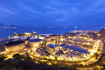Image showing Industrial oil tanks at night 