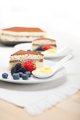 Image showing tiramisu dessert with berries and cream