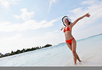 Image showing beautiful gril on beach have fun