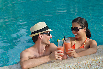 Image showing happy young couple have fun on beach