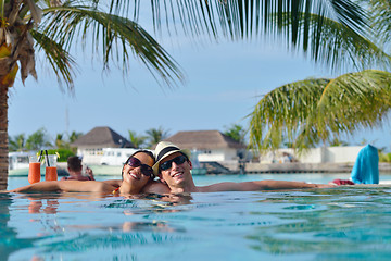 Image showing happy young couple have fun on beach