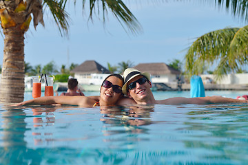 Image showing happy young couple have fun on beach