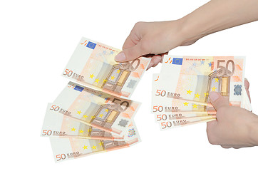 Image showing Woman paying with euro banknotes