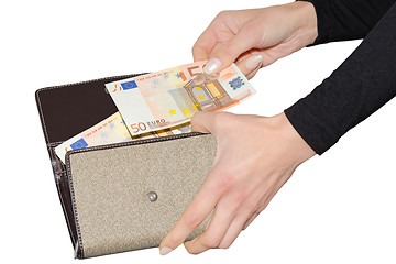 Image showing Woman paying with euro from her purse