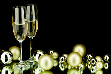 Image showing christmas decoration and champagne on black