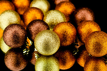 Image showing christmas decoration in orange on black