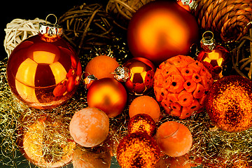 Image showing christmas decoration in orange on black