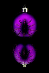 Image showing christmas decoration in purple on black
