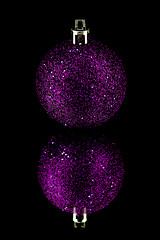 Image showing christmas decoration in purple on black