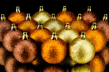 Image showing christmas decoration in orange on black