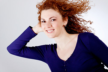 Image showing attractive young redhead woman smiling portrait