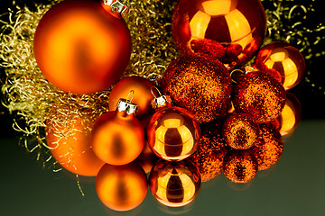 Image showing christmas decoration in orange on black