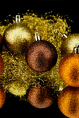 Image showing christmas decoration in orange on black