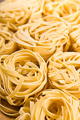 Image showing Raw tagliatelle close-up background