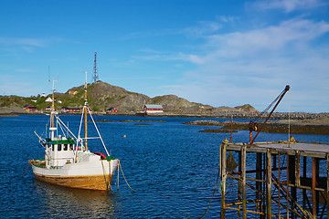 Image showing Fishing boat by pier