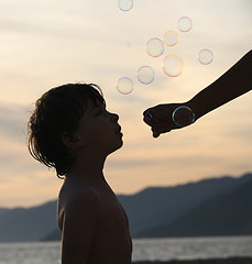 Image showing Boy with bubbles