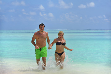Image showing happy young  couple at summer vacation have fun and relax at bea