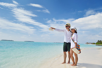 Image showing happy young couple have fun on beach