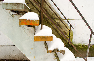 Image showing powdery snow cover the old cement stairs 