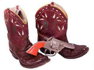 Image showing 1950s child's cowgirl boots and cap pistol