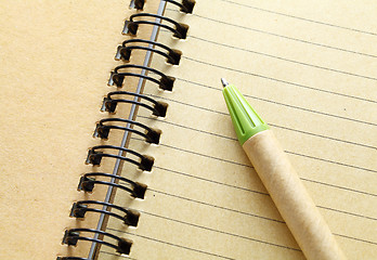 Image showing spiral notebook with pen 